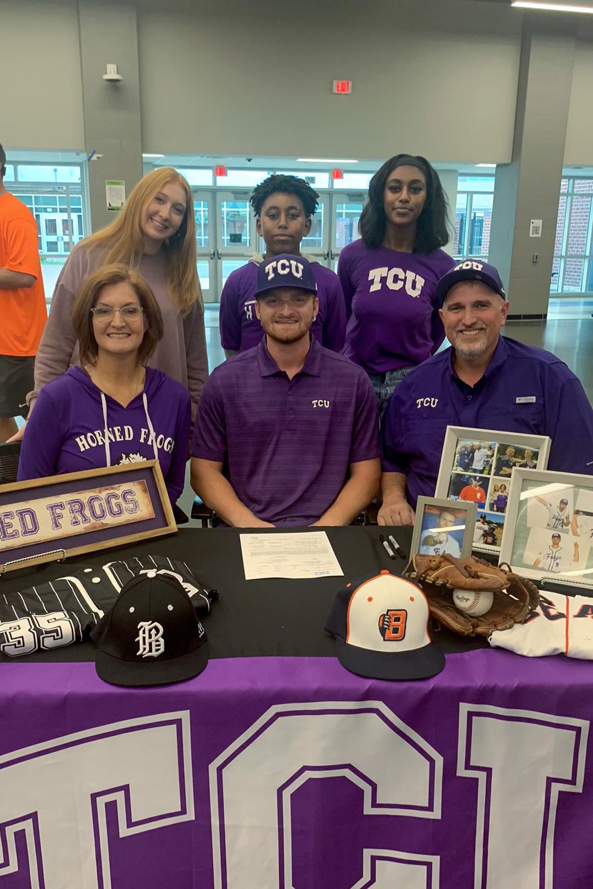 Bridgeland senior Murphy Brooks, seated center, signed a letter of intent to play baseball at Texas Christian University.